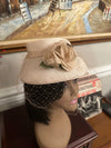 Elegant Champagne Floral Hat with Lace Netting